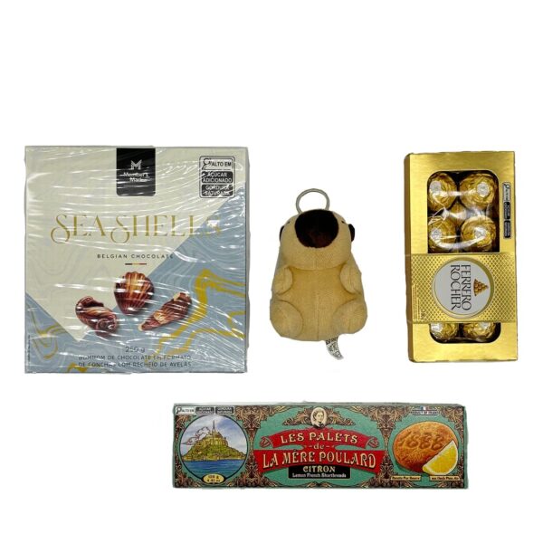 Itens da cesta de presente com doce importado e ferrero roche