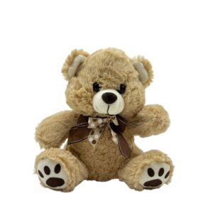 Pelúcia de Urso Bege com dois laços no fundo branco